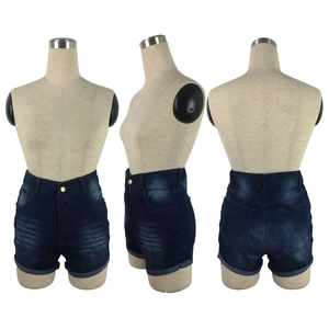 Three-way view of high-waisted denim shorts featuring whiskered wash and rolled cuffs