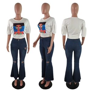 Women's white graphic T-shirt and vintage distressed flare jeans two-piece set outfits