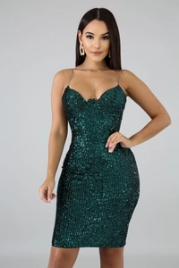 Close-up of deep green sequins and metal chain strap on a bodycon party dress