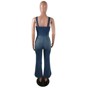 Rear view of slim fit denim jumpsuit featuring flare legs and classic back pockets