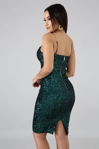 Detail of dark green sequin dress with gold zipper and thin metal chain straps