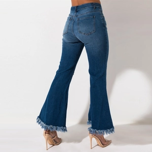 Detailed back view of high-waisted flared jeans with distressed fringe hems and pockets