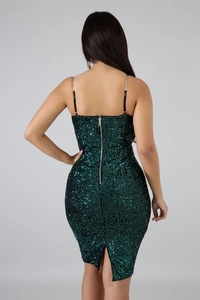 Detail view of dark green sequin midi dress featuring a metal zipper and back slit design