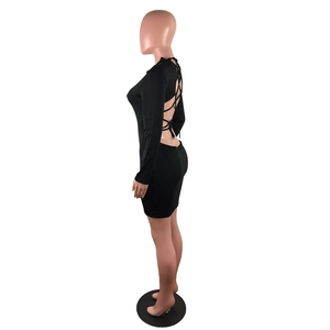 Detail of sexy backless mini dress featuring crisscross bandages and hollow-out design