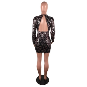 Detail of sequin bodycon dress showing back hollow out design and diamond patterns