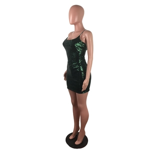 Detailed side view of slim fit dark green sequin mini dress with thin spaghetti straps