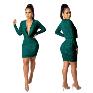 Sparkly dark green sequin long sleeve mini dress with a deep V-neck and slim fit cut