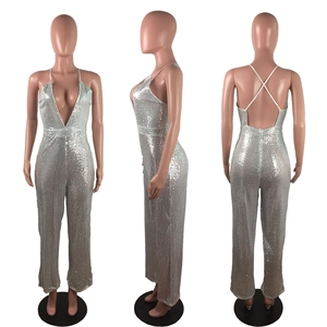 Front, side and back views of a silver sequined jumpsuit with deep V-neck and open back