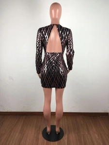 Detail of the open back design on a long sleeve sequined mini dress in rose gold