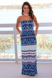 Close-up of bohemian geometric print dress featuring functional side pockets