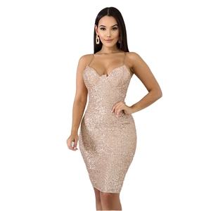 Detail of champagne gold sequined mini dress featuring slim fit and sweetheart neckline