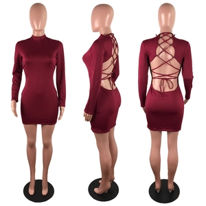 Three-way view of wine red backless dress with long sleeves and black crisscross bandage details