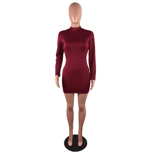 Detailed view of dark red high-neck bodycon dress with long sleeves and elastic fabric