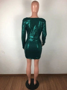 Back view of a green sequin long sleeve mini dress with a tight bodycon party silhouette