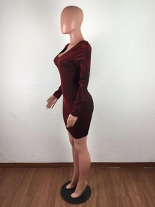 Detailed texture of dark red sequined fabric on a slim fit V-neck long sleeve dress