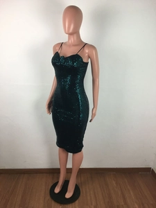 Detail of slim-fit dark green sequin party dress with delicate spaghetti straps