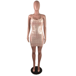 Detailed view of rose gold sequin mini dress featuring slim fit and thin straps