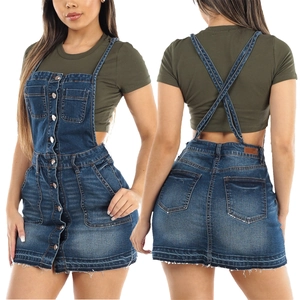 Women's backless denim pinafore dress with washed blue finish and metal buttons