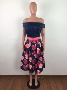 Detail des Blumenmusters und der Taillen-Patchwork am schulterfreien Maxikleid