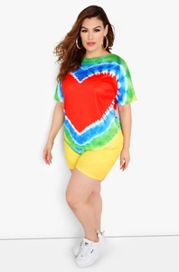 Detail view of tie-dye lounge set with red heart print and vibrant yellow shorts