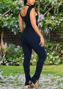 Slim fit backless denim jumpsuit featuring halter neck and side button details