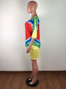 Side view of vibrant tie-dye short sleeve top and yellow slim-fit shorts set for summer