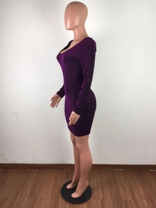 Detail of deep purple long sleeve bodycon dress with sparkling sequin texture and slim fit