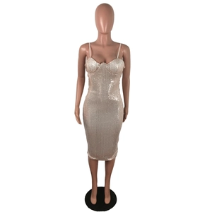 Detail of champagne sequin midi dress with slim fit and elegant spaghetti straps