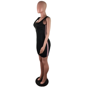 Detail of a slim fit black sleeveless mini dress featuring red and white side stripes