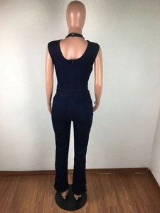Detail view showing open back design with metal ring strap on slim fit denim jumpsuit