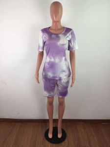Detailed view of women's purple tie-dye two-piece set featuring short sleeve top and shorts
