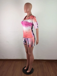 Detail of pink tie-dye summer two-piece set featuring short sleeve T-shirt and shorts