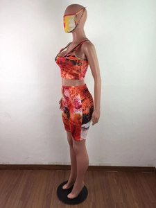 Detailed view of women's 3-piece tie-dye lounge set with top, bike shorts and mask