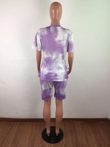 Back view of women's purple tie-dye two-piece set with t-shirt and elastic shorts