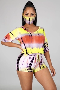 Detailed close-up of vibrant tie-dye pattern on three-piece casual women set