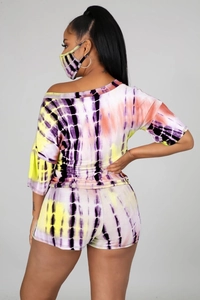Rear view of vibrant tie-dye three-piece set with off-shoulder top and matching shorts