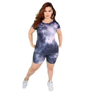 Detail of grey and white tie-dye casual two-piece set with round neck t-shirt and shorts