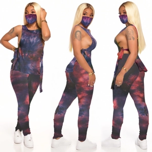 Three-piece tie-dye set including face mask, side-tie crop top, and leggings in purple