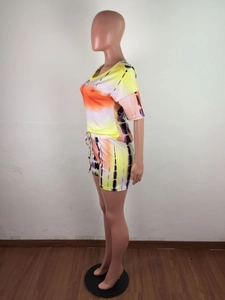 Detail of colorful tie-dye casual two-piece set with elastic drawstring shorts and V-neck top