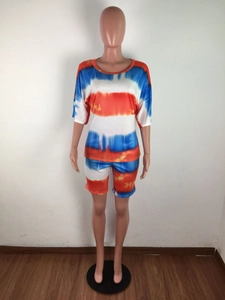 Detail of red and blue tie-dye pattern on stretch fabric women's two-piece lounge set