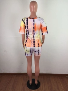 Back view of a two-piece tie-dye set with a round neck T-shirt and slim shorts