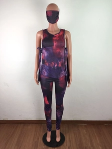 Detailed view of women's 3-piece tie-dye lounge set including tank top, pants, and face mask
