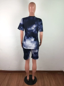Detailed back view of a blue tie-dye lounge set featuring a T-shirt and shorts