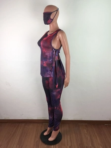 Detailed view of women's purple tie-dye three-piece set with mask, top, and leggings