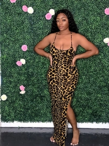 Close-up of leopard print summer dress featuring spaghetti straps and a side high slit