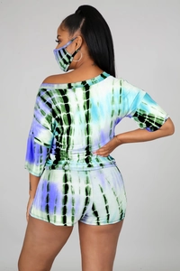 Rear view of women's tie-dye two-piece set featuring short sleeve top and matching mask