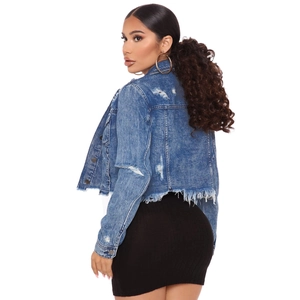 Short blue denim jacket with distressed ripped details and frayed fringe hem for women