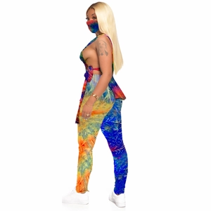 Detailed view of colorful tie-dye 3-piece set with crop top, leggings and face mask