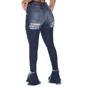 High waist distressed flare jeans with fringe hem and ripped details in dark blue wash