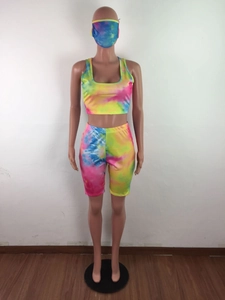 Detailed view of the three-piece tie-dye lounge set including a matching face mask